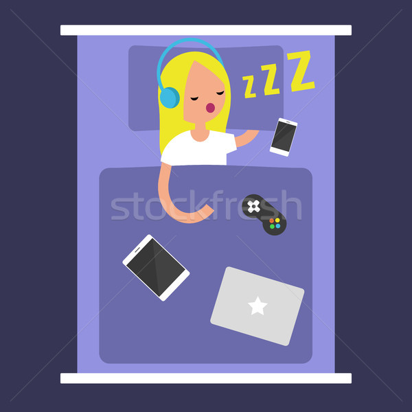 Stock photo: New Technologies Addiction. young blonde girl sleeping with all 