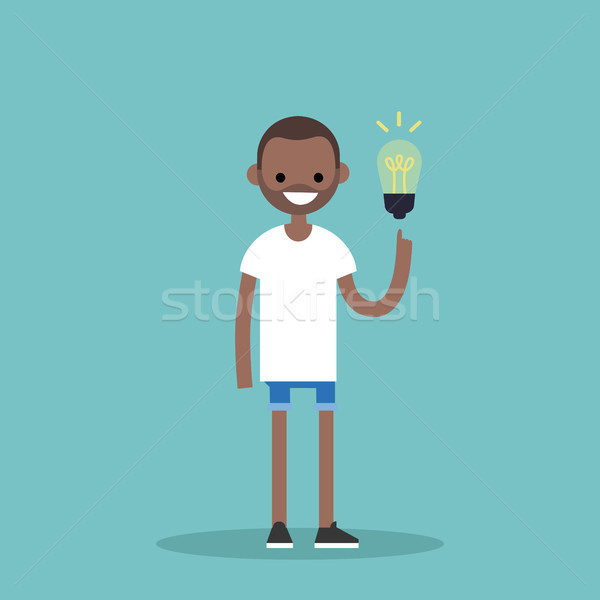 Idea Concept. Aha moment. Young smiling black boy is pointing a  Stock photo © nadia_snopek