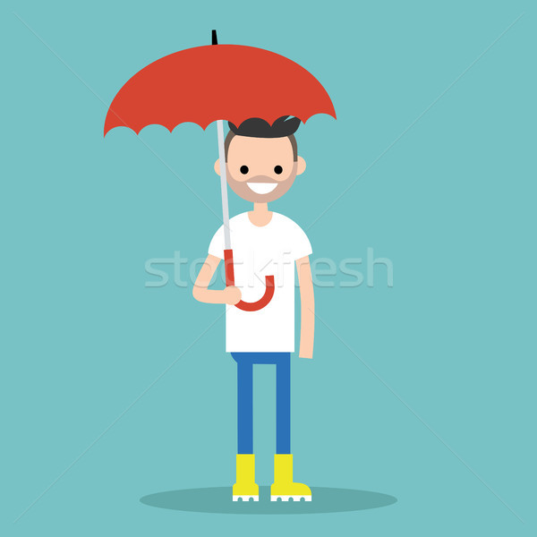 Young smiling character with umbrella wearing yellow rubber boot Stock photo © nadia_snopek