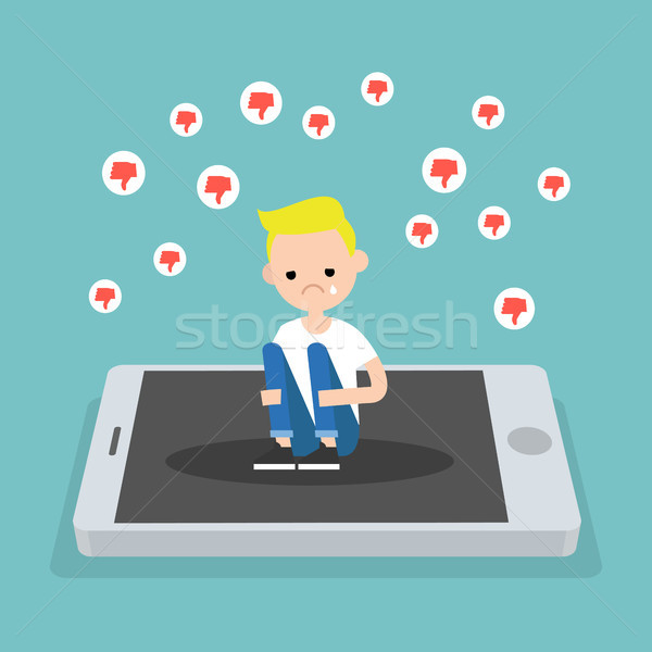Upset crying blond boy sitting on the mobile's screen and huggin Stock photo © nadia_snopek