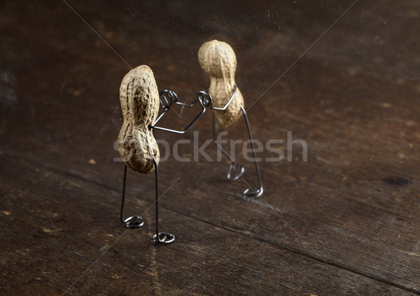 Abgesondert Paar Erdnuss Menschen Glas Wand Stock foto © nailiaschwarz