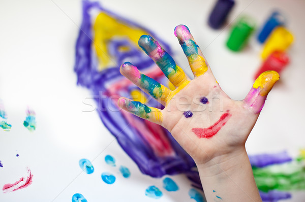 Little Children Hands doing Fingerpainting Stock photo © nailiaschwarz