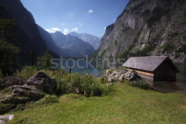 Lago cielo sol montana montanas Foto stock © nailiaschwarz