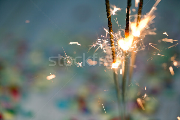 Confettis brûlant coloré table en bois fête anniversaire [[stock_photo]] © nailiaschwarz