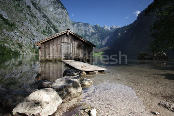 Lago cielo sol montana montanas Foto stock © nailiaschwarz