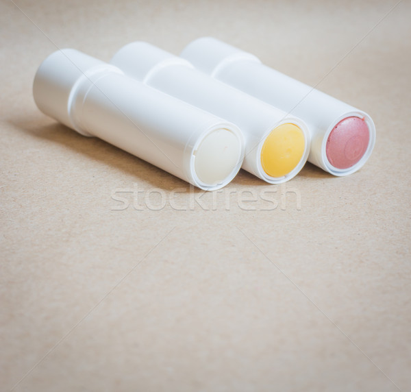 Moisturizer lipstick on brown natural background Stock photo © nalinratphi