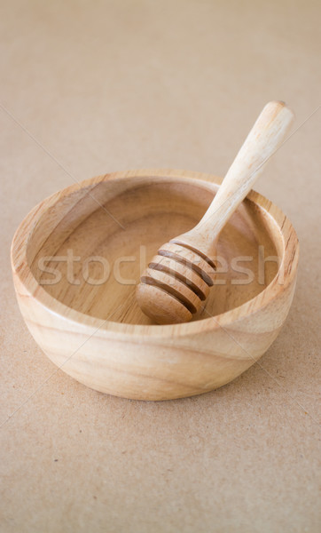 Wooden bowl and dipper on brown background Stock photo © nalinratphi