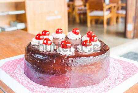 Fresh bake chocolate cake topped with cherry Stock photo © nalinratphi