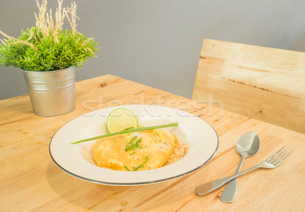 Pad Thai, stir-fried rice noodles with egg Stock photo © nalinratphi