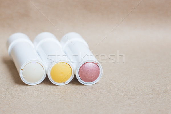 Moisturizer lipstick on brown natural background Stock photo © nalinratphi