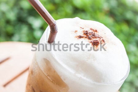 Refreshing glass of iced blended frappucino with milk foam Stock photo © nalinratphi