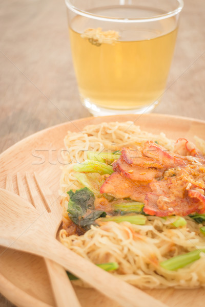 Wheat noodles with barbecued red pork Stock photo © nalinratphi