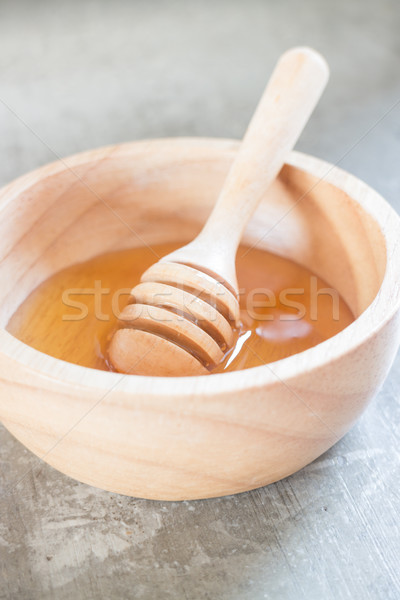 Golden honey cup and dipper Stock photo © nalinratphi