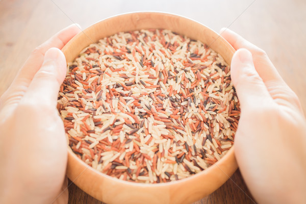 Hand hold multi whole jusmine rice bowl Stock photo © nalinratphi