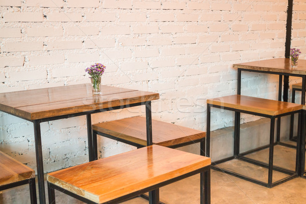 Room interior white brick wall with wooden table Stock photo © nalinratphi
