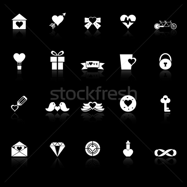 Love and heart icons with reflect on black background Stock photo © nalinratphi