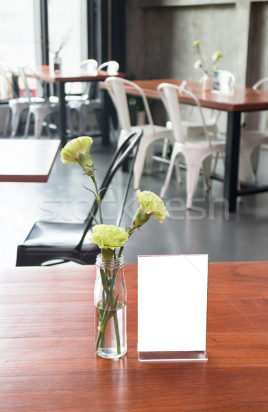 Mock up frame on table in bar restaurant cafe Stock photo © nalinratphi