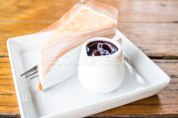 Whipped cream crepe cake with blueberry sauce Stock photo © nalinratphi