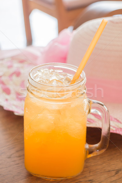 Fresh orange juice serving on wooden table Stock photo © nalinratphi