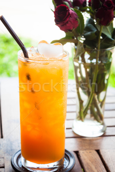 Fresh iced orange juice in home garden Stock photo © nalinratphi