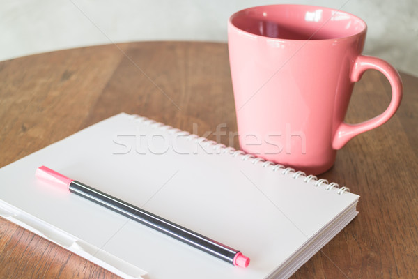 Notepaper and hot drink on wooden table Stock photo © nalinratphi