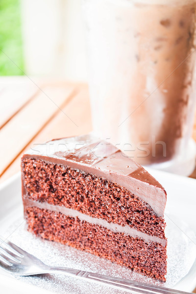 Bitter sweet meal with iced coffee and chocolate cake  Stock photo © nalinratphi