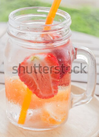 Infused water bottle of mix fruit refreshing drink Stock photo © nalinratphi