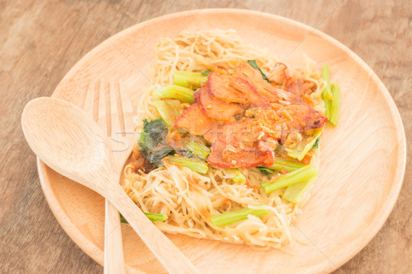 Wheat noodles with barbecued red pork Stock photo © nalinratphi