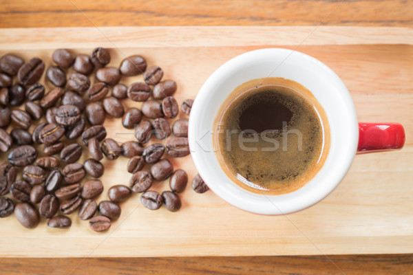 Fresh brewed hot espresso with roasted bean Stock photo © nalinratphi