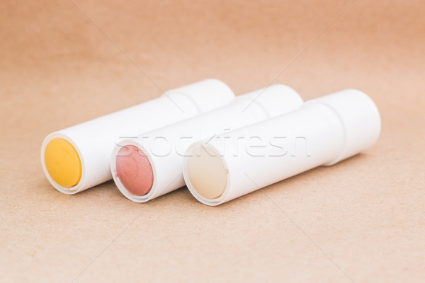 Moisturizer lipstick on brown natural background Stock photo © nalinratphi