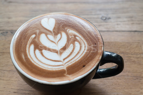 Hot cup of latte art coffee Stock photo © nalinratphi