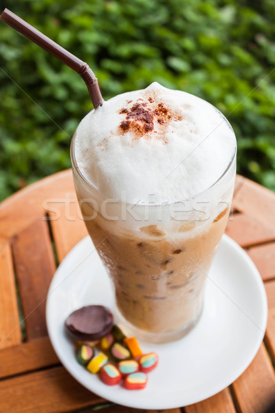 Refreshing iced milk coffee and some sweet Stock photo © nalinratphi