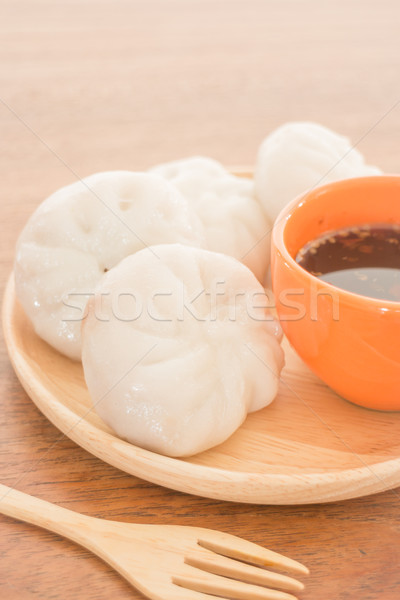 Steamed dumpling stuff on wooden plate Stock photo © nalinratphi