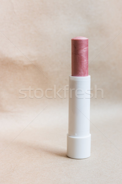 Moisturizer lipstick on brown natural background Stock photo © nalinratphi