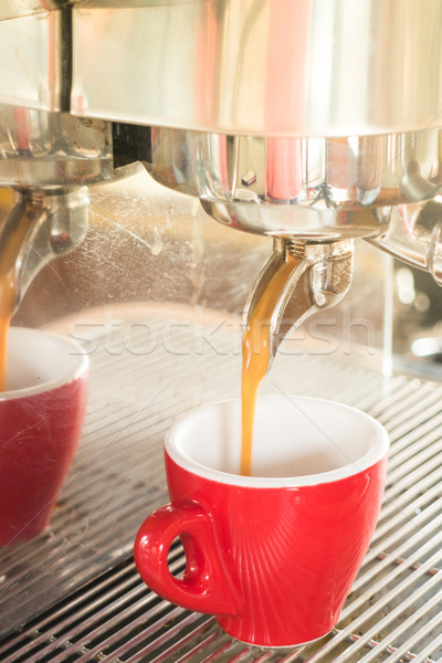 Fresh brewing hot coffee from espresso machine with vintage filt Stock photo © nalinratphi
