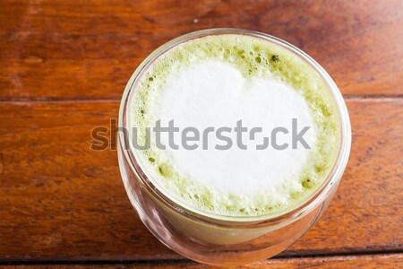 Hot matcha green tea latte in glass Stock photo © nalinratphi