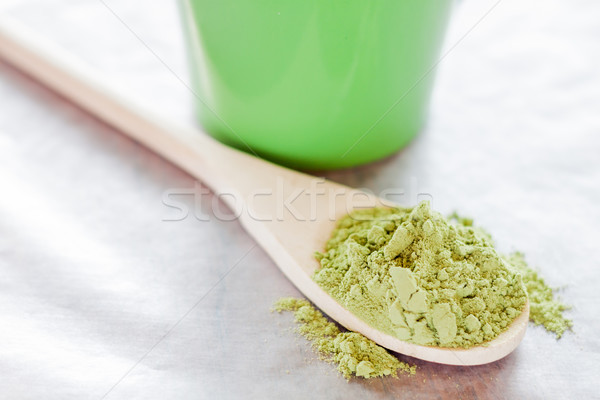 Powdered green tea with wooden spoon  Stock photo © nalinratphi