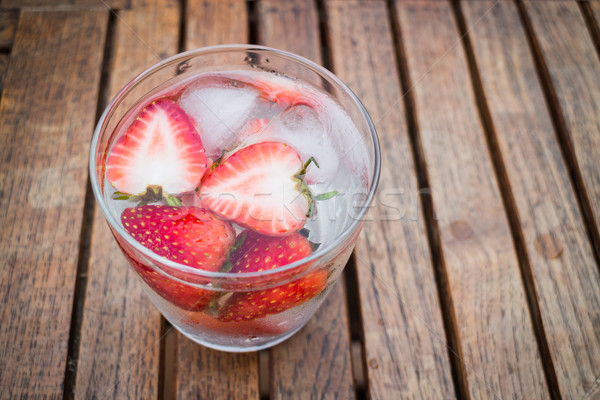 Close-up glass of strawberry infused water Stock photo © nalinratphi