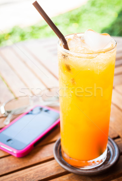 Summer fresh time with orange juice and straw Stock photo © nalinratphi