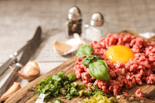 beer snack Beef tartare with pickled cucumber  Stock photo © Naltik