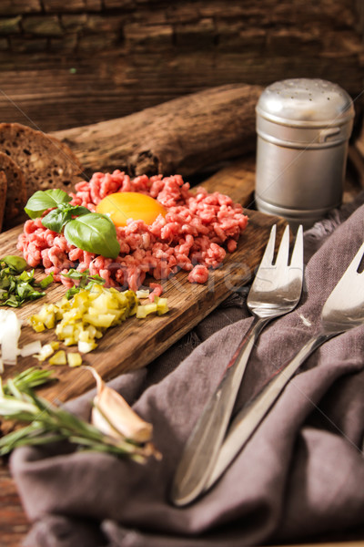 beer snack Beef tartare with pickled cucumber  Stock photo © Naltik