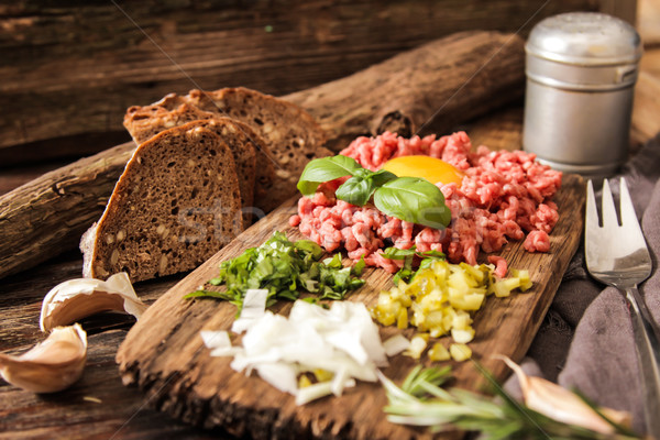 beer snack Beef tartare with pickled cucumber  Stock photo © Naltik