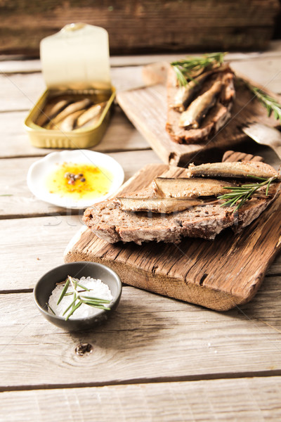 Sandwich Tapas with sardines, sprats with olives and salt Stock photo © Naltik
