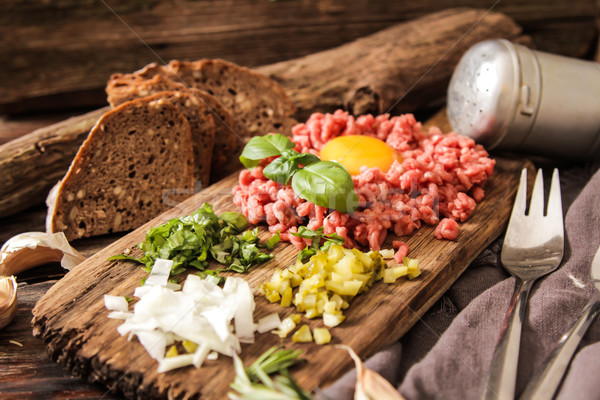 beer snack Beef tartare with pickled cucumber  Stock photo © Naltik