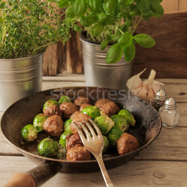 meatballs with cabbage and basil in a pan Stock photo © Naltik