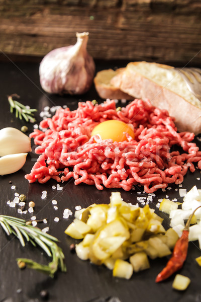 beer snack Beef tartare with pickled cucumber  Stock photo © Naltik