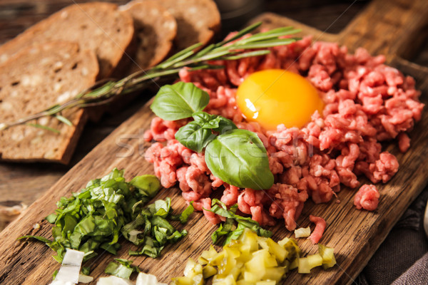 beer snack Beef tartare with pickled cucumber  Stock photo © Naltik