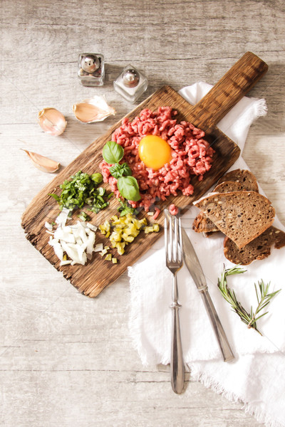 beer snack Beef tartare with pickled cucumber  Stock photo © Naltik