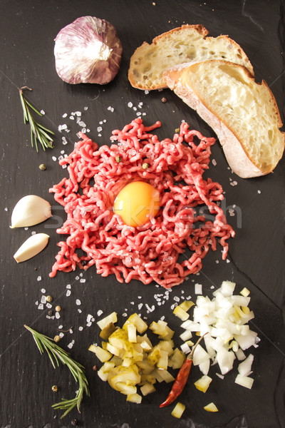 beer snack Beef tartare with pickled cucumber  Stock photo © Naltik