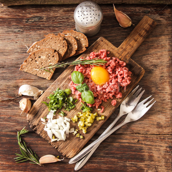 beer snack Beef tartare with pickled cucumber  Stock photo © Naltik